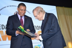 Prime Minister Holness delivers award to Sir Edward Seaga for lifetime involvement in the countries cultural and political landscape.